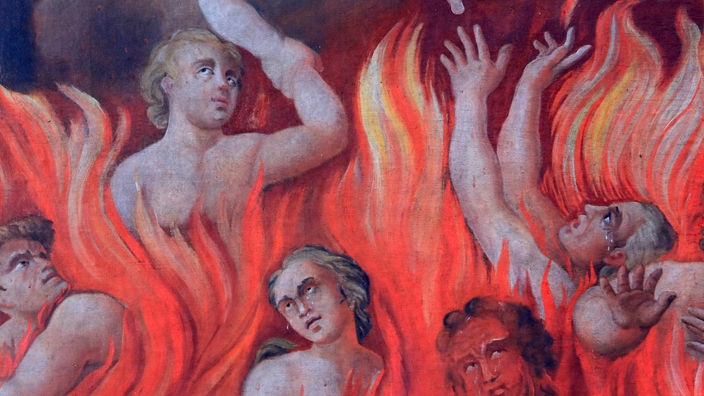 Holzschnitt von etwa 1480: Schreiende Menschen in einem Feuer