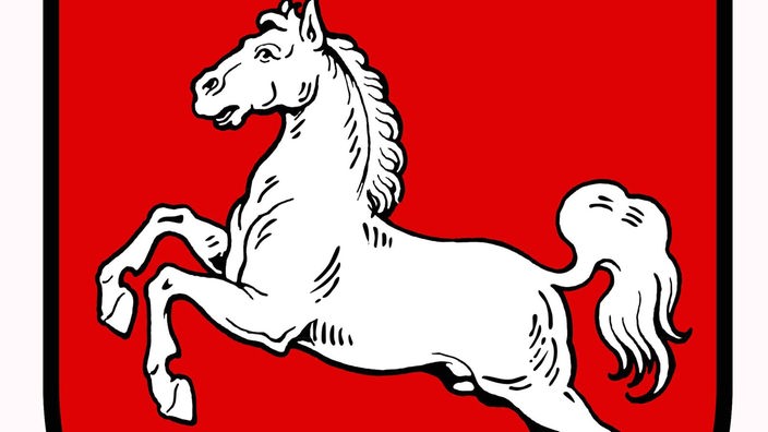 Das Landeswappen von Niedersachsen: Ein weißes Pferd auf rotem Hintergrund.