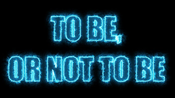 Das Shakespeare-Zitat "To be or not to be" in leuchtenden Buchstaben