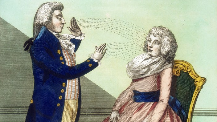 Eine historische Zeichnung zeigt eine Frau, die von einem Mann hypnotisiert wird