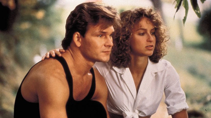 Filmszene aus "Dirty Dancing" mit Patrick Swayze und Jennifer Grey. | Bildquelle: Imago Filmszene aus "Dirty Dancing" mit Patrick Swayze und Jennifer Grey.