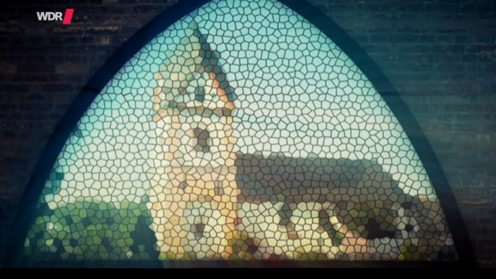Aus Mosaikenstücken abgebildetes Kirchengebäude.