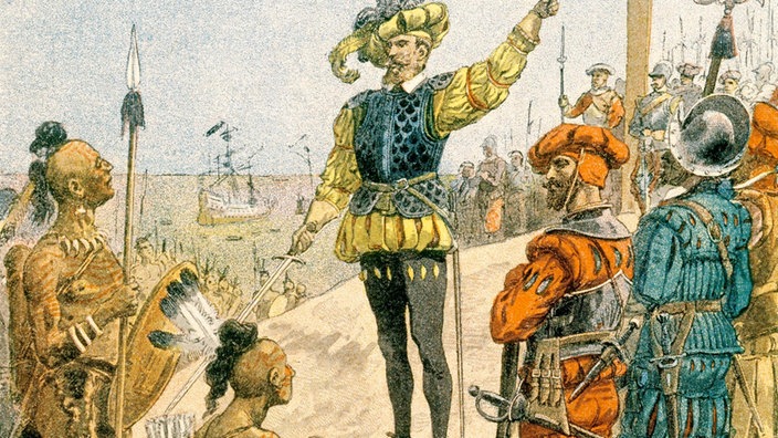 Jacques Cartier vor einem hohen Holzkreuz zu Ehren des französischen Königs. Vor ihm stehen und knien einige Ureinwohner | Bildquelle: akg Jacques Cartier vor einem hohen Holzkreuz zu Ehren des französischen Königs. Vor ihm stehen und knien einige Ureinwohner