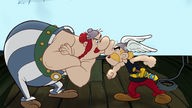 Die Zeichentrickfiguren Asterix und Obelix streiten sich. 