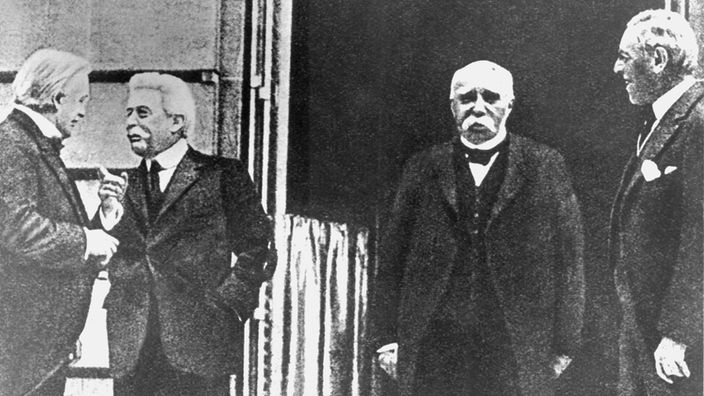 Die Ministerpräsidenten David Lloyd George (England), Vittorio Emanuele Orlando (Italien), Georges Benjamin Clemenceau (Frankreich) und der amerikanische Präsident Woodrow Wilson - 1919