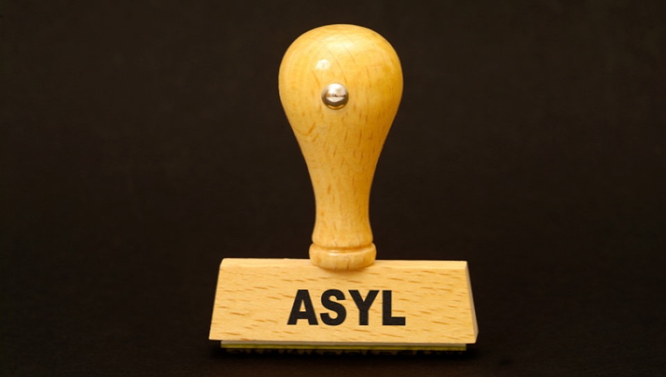 Stempel mit der Aufschrift "Asyl".