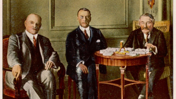 Gustav Stresemann mit Aristide Briand und Sir Joseph Austen Chamberlain.
