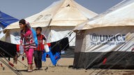 Zwei Kinder in einem irakischen Flüchtlingscamp.