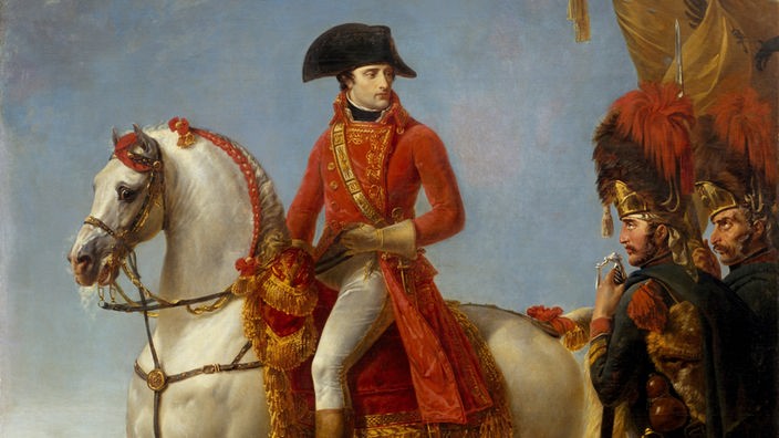 Napoleon mit typischem schwarzen Hut hoch zu Ross