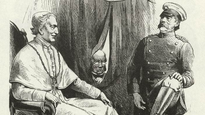Eine Karikatur zeigt Bismarck und Papst Leo III. zusammen sitzend