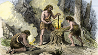 Zeichung von drei Steinzeitmenschen, die Feuer machen