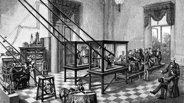 Historischer Stich: Elektrotherapie in einer mit mehreren Patienten (1886)