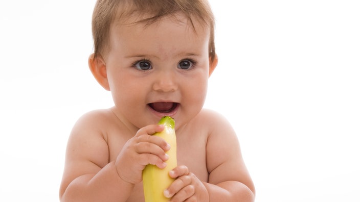 Baby mit Banane | Bildquelle: dpa/Bildagentor-o Baby mit Banane