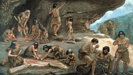 Das Gemälde stellt eine urzeitliche Gemeinschaft dar: Im Schutz eines Felsenvorsprungs verarbeiten Männer und Frauen gemeinsam ihre Beute.