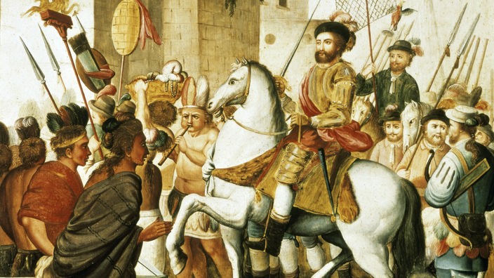 Auf dem Gemälde wird Hernan Cortes auf einem weißen Pferd gezeigt.
