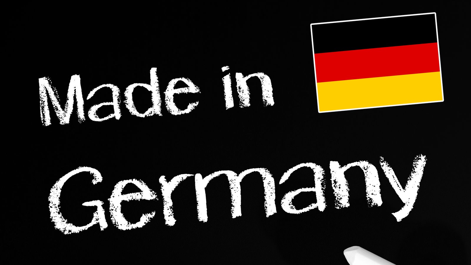 Grafik: Auf schwarzem Hintergrund steht mit weißer Kreide "Made in Germany" geschrieben.