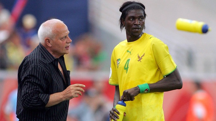 Otto Pfister mit Emmanuel Adebayor | Bildquelle: Imago/UPI Photo Otto Pfister mit Emmanuel Adebayor