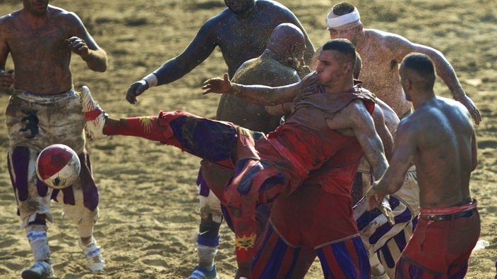 Mehrere Spieler beim Calcio Storico | Bildquelle: Imago/Xinhua/Jin Yu Mehrere Spieler beim Calcio Storico