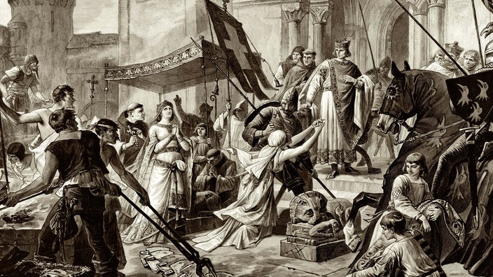 Holzstich: Kaiserin Kunigunde, die Gemahlin von Kaiser Heinrich II., wird der ehelichen Untreue verdächtigt und der Feuerprobe unterworfen | Bildquelle: WDR/dpa/Judaica-Sammlung Holzstich: Kaiserin Kunigunde, die Gemahlin von Kaiser Heinrich II., wird der ehelichen Untreue verdächtigt und der Feuerprobe unterworfen