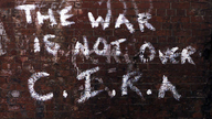 Graffiti "The war is not over C.I.R.A".