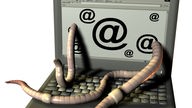 Die Grafik zeigt einen Computer, aus dessen Bildschirm Würmer kommen.