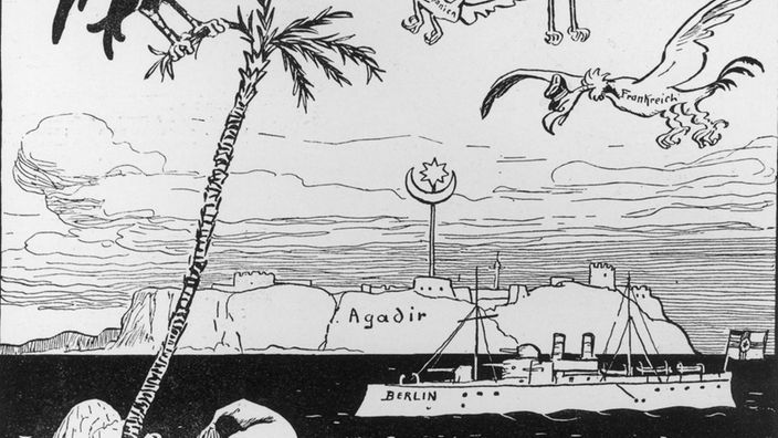Eine Karikatur nimmt die Marokko-Krise von 1911 aufs Korn. Geier, die Deutschland, Großbritannien und England darstellen, kreisen begierig um das Kamel Marokko.