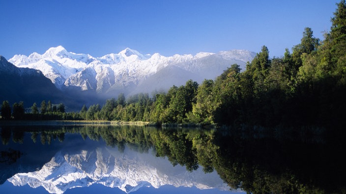 Neuseeland, Mount Cook - See und schneebedeckte Berge | Bildquelle: Mauritius/Photo New Zealand Neuseeland, Mount Cook - See und schneebedeckte Berge