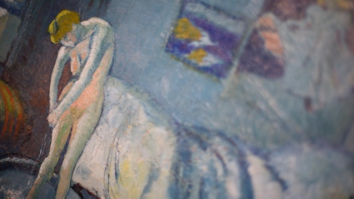 Das Gemälde "Der blaue Raum" zeigt eine nackte Frau in einer Badewanne