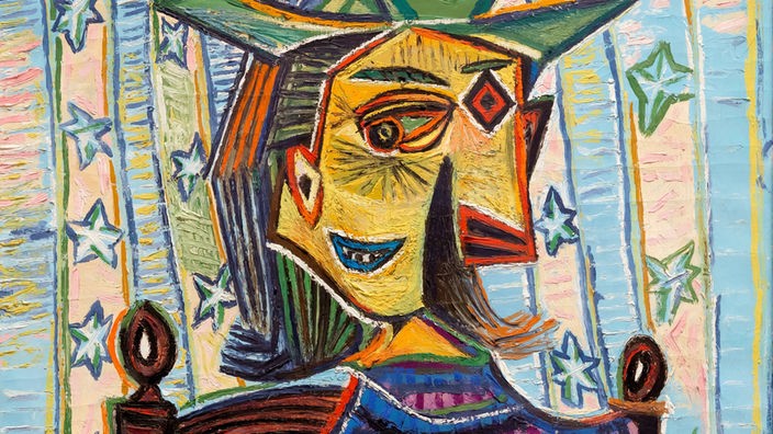 Das Gemälde „Dora Maar im Sessel“ zeigt eine Frau, die aus verschiedenen geometrischen Formen zusammengesetzt ist
