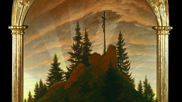 Das Gemälde "Kreuz im Gebirge" wird auch "Tetschener Altar" genannt. Es zeigt ein Kreuz im Sonnenuntergang auf einem hohen Felsen, dahinter weisen Lichtstrahlen in den Himmel | Bildquelle: akg-images Das Gemälde "Kreuz im Gebirge" wird auch "Tetschener Altar" genannt. Es zeigt ein Kreuz im Sonnenuntergang auf einem hohen Felsen, dahinter weisen Lichtstrahlen in den Himmel