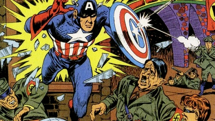Ein Cover des Comichefts Captain America zeigt den Superheld, wie er Adolf Hitler angreift. | Bildquelle: picture alliance / The Advertisi Ein Cover des Comichefts Captain America zeigt den Superheld, wie er Adolf Hitler angreift.