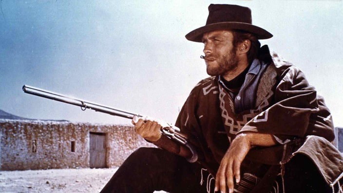 Clint Eastwood mit Zigarette und Gewehr