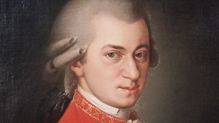 Ölgemälde: Mozart mit weißer Lockenperücke und rotem Gehrock.
