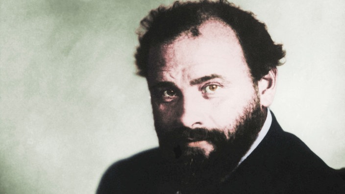 Porträtfoto Gustav Klimts: rundlicher Mann mit Vollbart und kurzen Locken. | Bildquelle: akg Porträtfoto Gustav Klimts: rundlicher Mann mit Vollbart und kurzen Locken.
