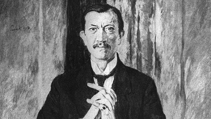 Ein gemaltes Porträt, das Karl Ernst Osthaus zeigt. Er sitzt frontal in einem Stuhl mit gefalteten Händen.