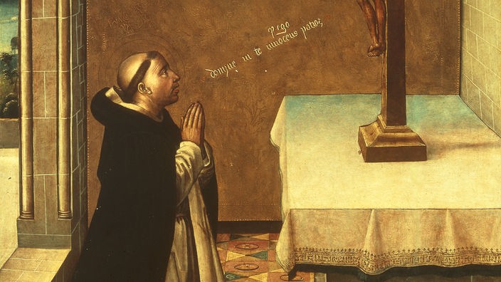 Gemälde: Ein Mönch kniet betend vor einem Altar, auf dem ein Kruzifix steht.