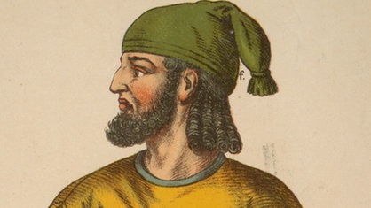 Grafik: Ein Mann mit Vollbart, Locken, grüner Mütze und orangefarbenem Umhang. | Bildquelle: akg-images Grafik: Ein Mann mit Vollbart, Locken, grüner Mütze und orangefarbenem Umhang.