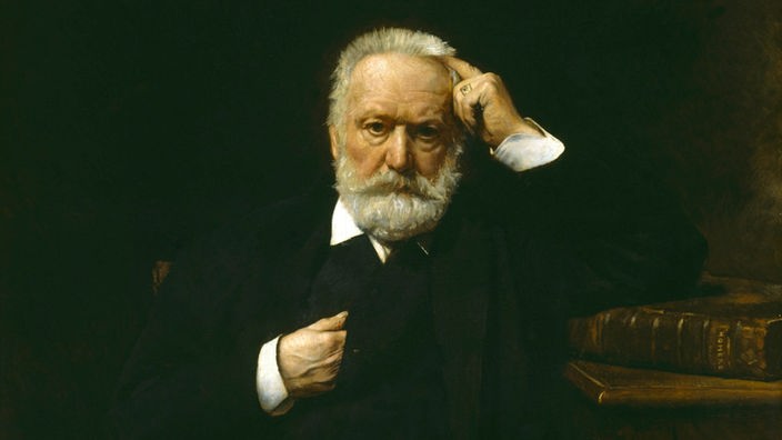 Gemälde von Victor Hugo, in einem Sessel sitzend.