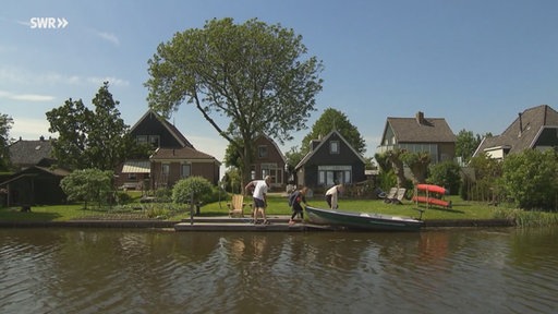 Reihenhäuser mit Garten direkt am Wasser