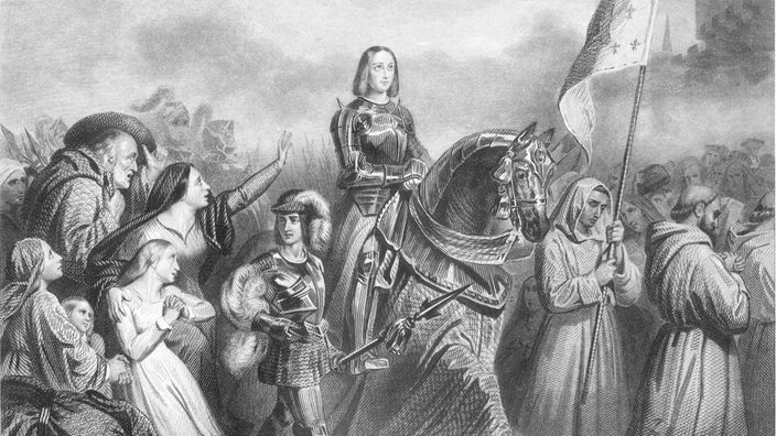 Eine zeitgenössische Darstellung zeigt Jeanne d'Arc in Männerkleidung und zu Pferd