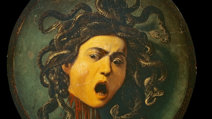 Das Ölbild zeigt einen abgeschlagenen Kopf mit aufgerissenem Mund, starrem Blick und Haaren, die wie Schlangen das Haupt umgeben. Aus dem Hals strömt Blut.