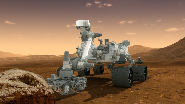 Künstlerische Darstellung des Rovers Curiosity bei seiner Arbeit auf der Marsoberfläche. | Bildquelle: dpa Künstlerische Darstellung des Rovers Curiosity bei seiner Arbeit auf der Marsoberfläche.