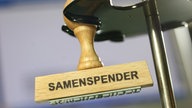 Stempel mit der Aufschrift "Samenspender"