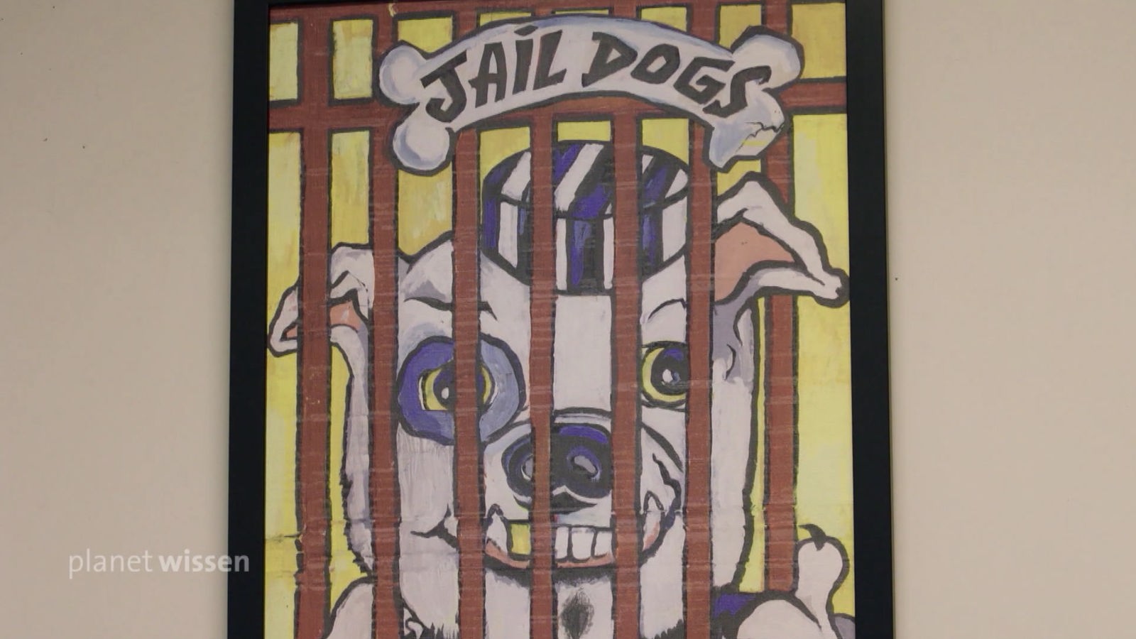Wandmalerei: Ein Hund hinter Gittern in Gefängniskleidung. Darüber steht 'Jail Dogs'.