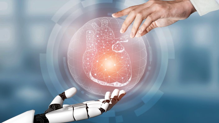 Roboterhand und Menschenhand halten ein stilisiertes menschliches Herz. | Bildquelle: mauritius images Roboterhand und Menschenhand halten ein stilisiertes menschliches Herz.