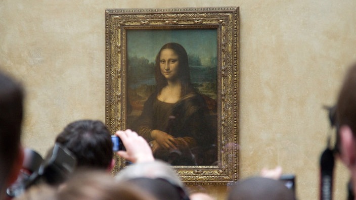 Gemälde "Mona Lisa" im Louvre umringt von Touristen | Bildquelle: dpa Picture-Alliance / Friso Gentsch Gemälde "Mona Lisa" im Louvre umringt von Touristen
