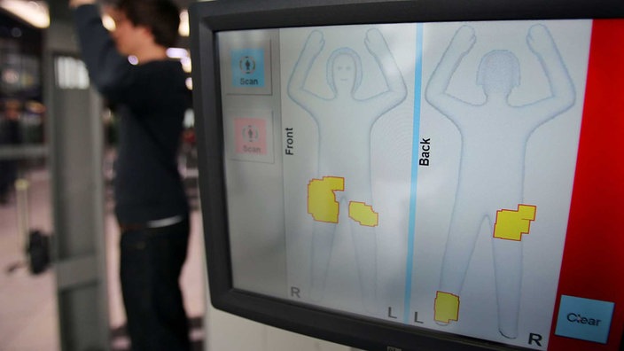 Aufnahme eines Körperscanners in vereinfachter Darstellung | Bildquelle: dpa/Oliver Berg Aufnahme eines Körperscanners in vereinfachter Darstellung