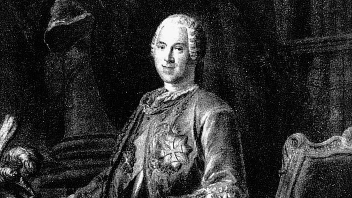 Kupferstich von Graf Heinrich von Brühl, der an einem kleinen Tisch steht. | Bildquelle: dpa Picture-Alliance, Bifab Kupferstich von Graf Heinrich von Brühl, der an einem kleinen Tisch steht.